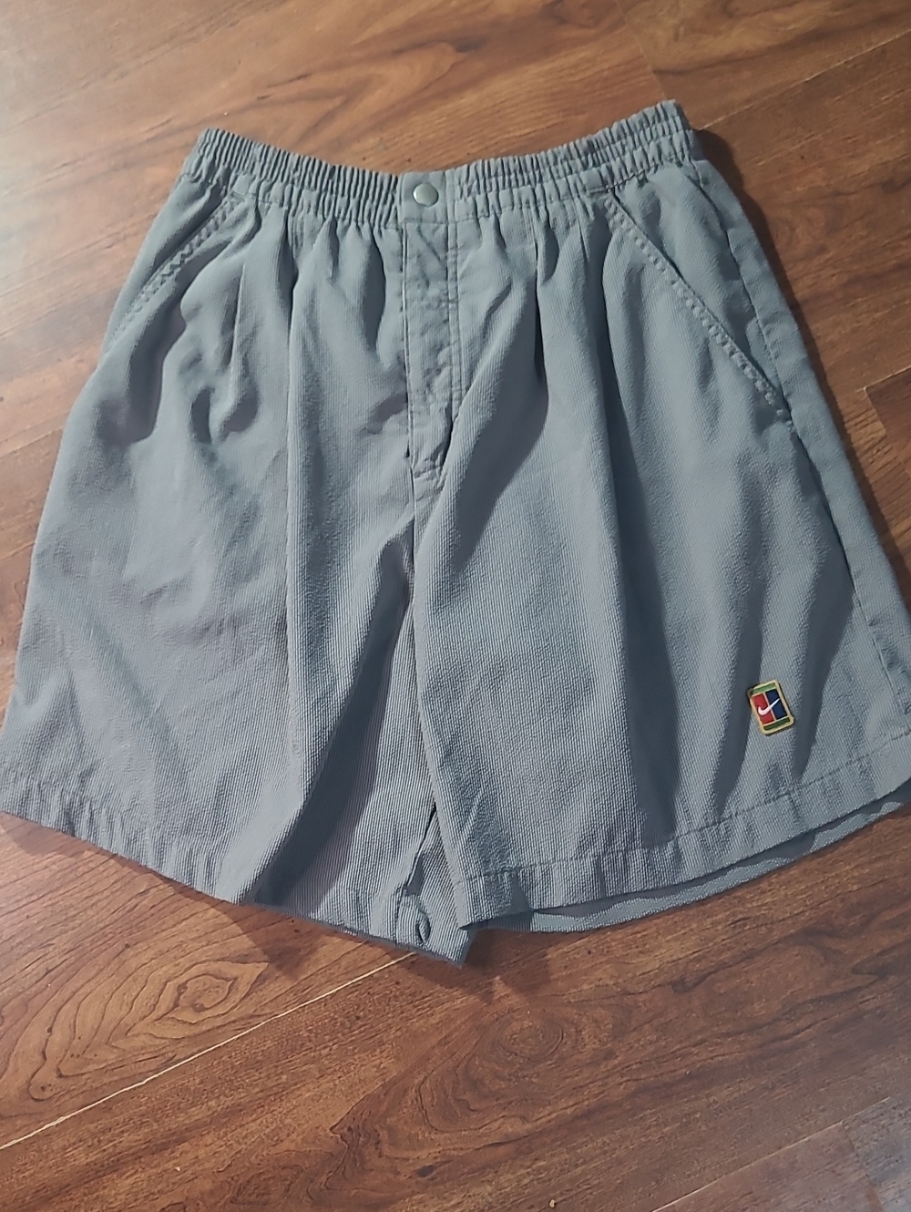 vintage 1990s Nike Challenge Court tennis shorts featuring a small Mens Size M